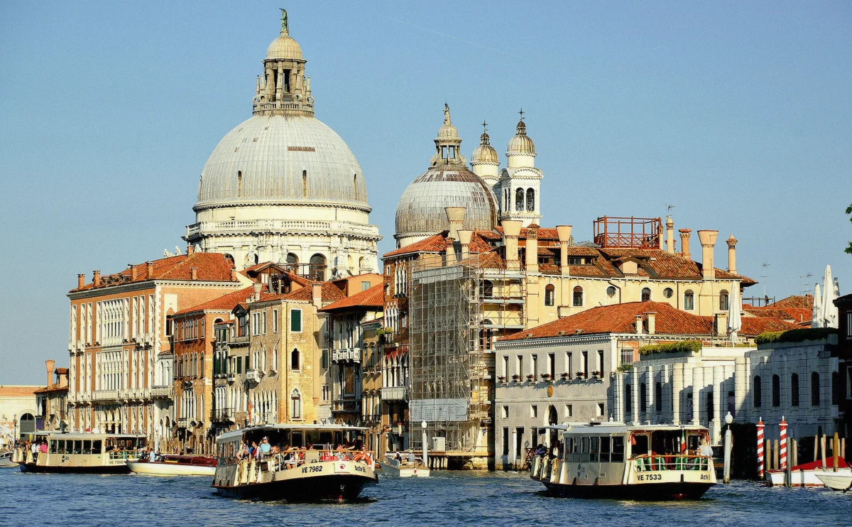 ACTV vaporetto line 12 waterbus at a Venice pier departing for Murano and Burano