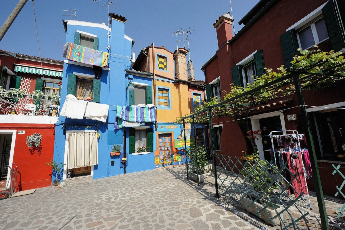 Casa Bepi, the most elaborately painted house on Burano, its freehand squares best photographed in afternoon light