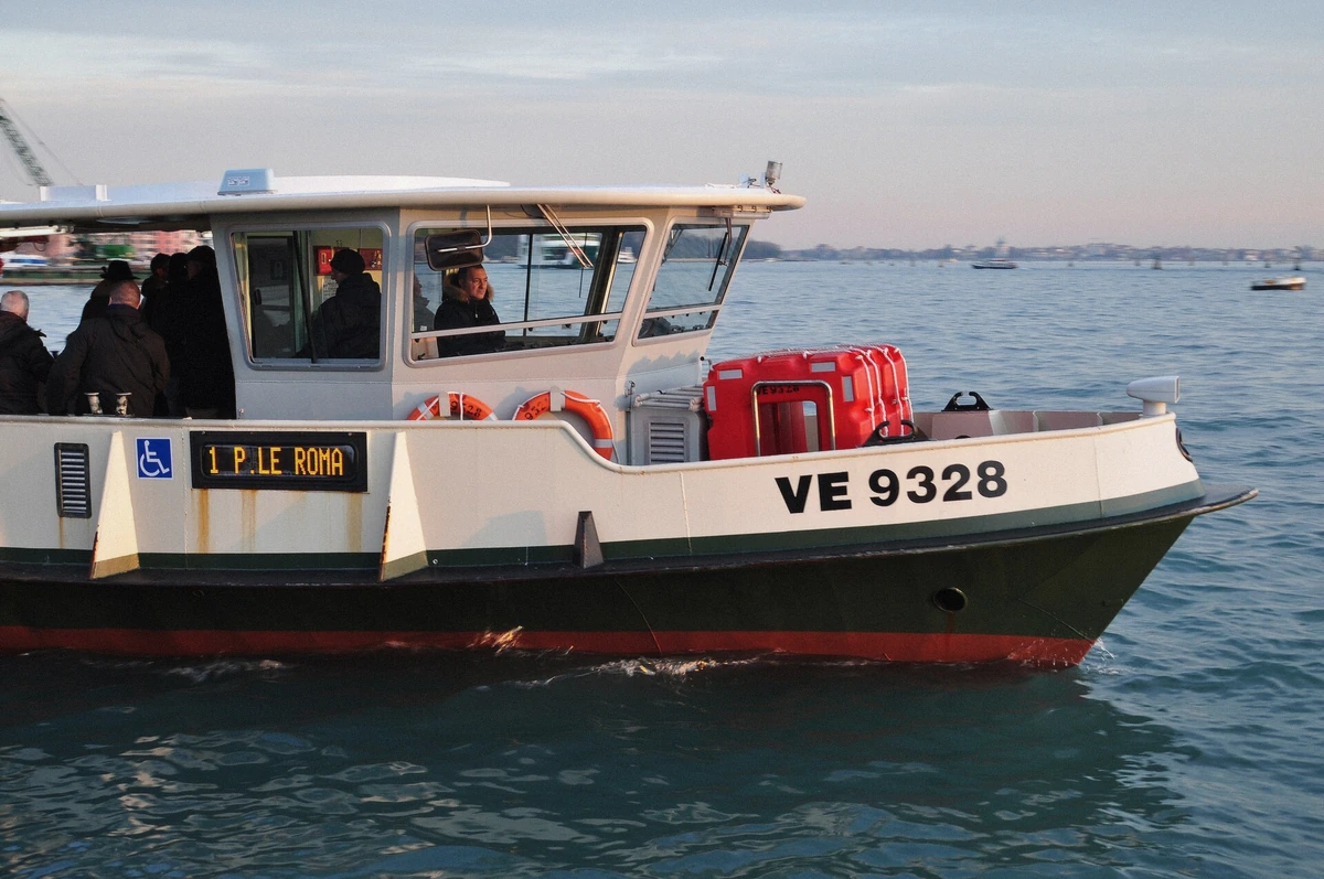 On the deck of an ACTV vaporetto crossing the northern lagoon, the DIY route to Murano and Burano